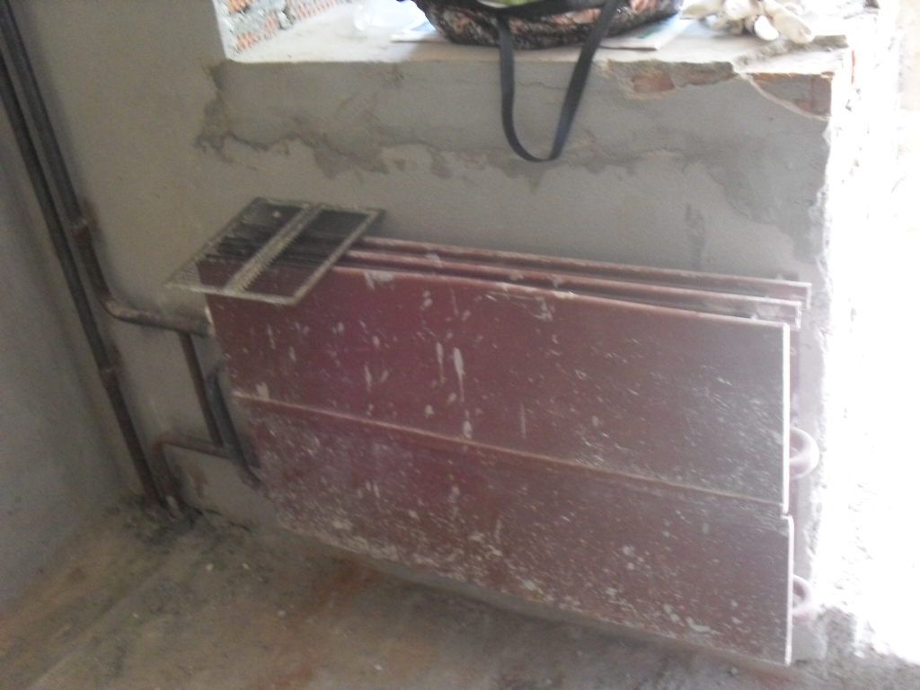 радиатор отопления в квартире с черновой отделкой